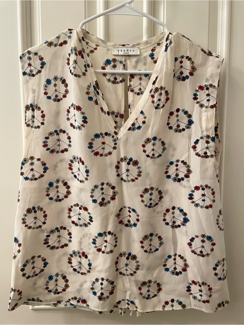 Sandro Cream Sleeveless V-Neck Top with Blue & Red Floral Peace Signs